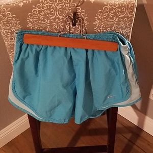 Turquoise Nike running shorts